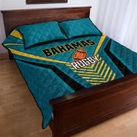 Teal quilt and two matching pillows with Bahamas Rugby emblem and yellow diagonal stripes