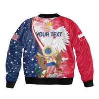 Red and navy bomber jacket with eagle graphic, ribbed black collar and cuffs