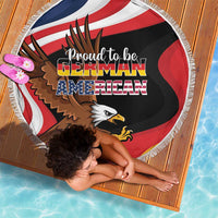 Round beach blanket with fringed edge, eagle face and German-American lettering on red, white, black