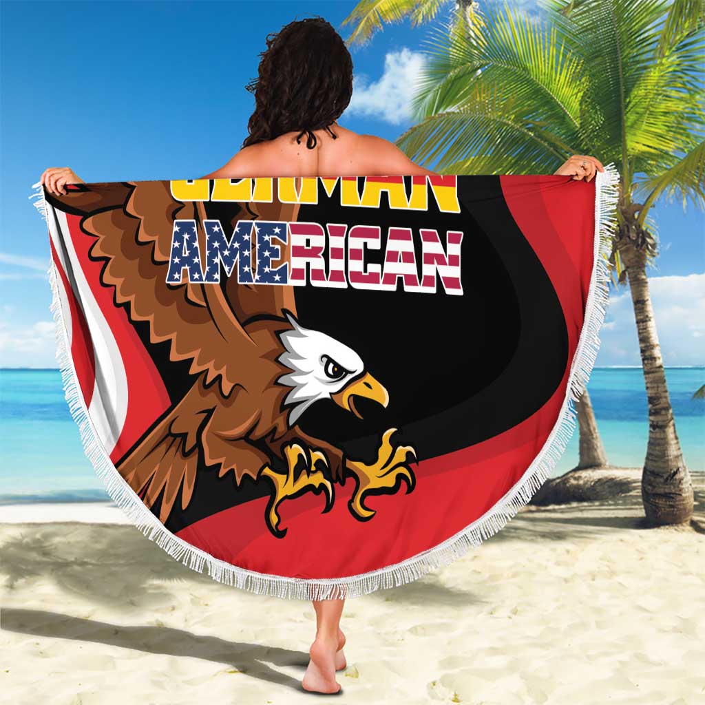 Round beach blanket with fringed edge showing eagle emblem and German-American lettering on red and black