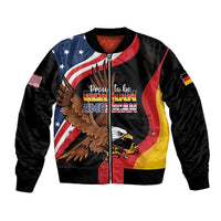 Black unisex bomber jacket with eagle graphic, German-American text, and flag stripes