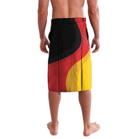 Black elastic-waist shorts with red yellow flag stripe graphic