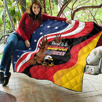 Quilt blanket showing German-American eagle and American flag stripes with quilt stitching
