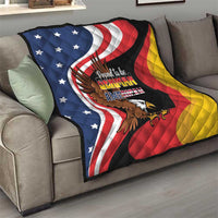 German-American eagle quilt draped on a sofa with stars, stripes, and yellow edge panel