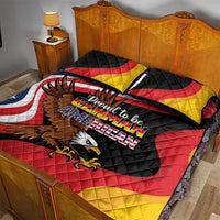 Black quilt bed set with eagle and Proud to be German-American lettering, red yellow blue.