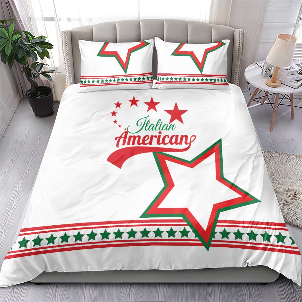 White bedding set on bed with “Italian American” and large green/red star graphic