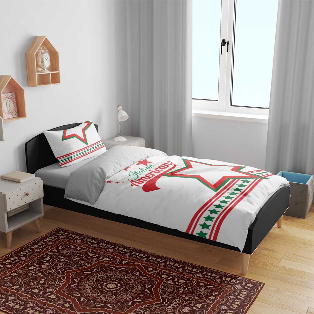 White bedding set on bed with “Italian American” and large green/red star on duvet