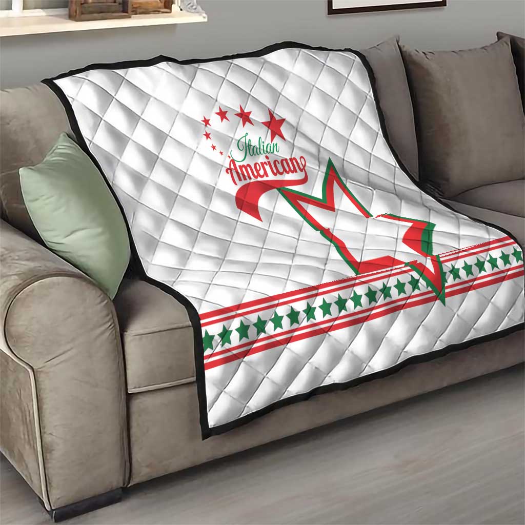 White quilt on sofa with diamond stitching, Italian American logo and star graphic