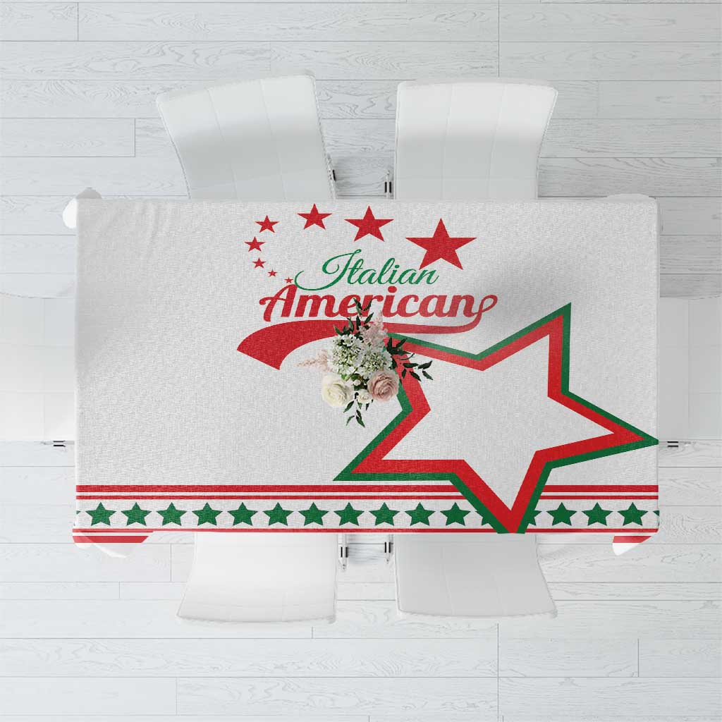 White tablecloth with red and green star banner and floral accent design