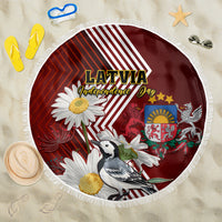 Round beach blanket with white fringe, red Latvia graphic with daisy, bird, crest, stripes