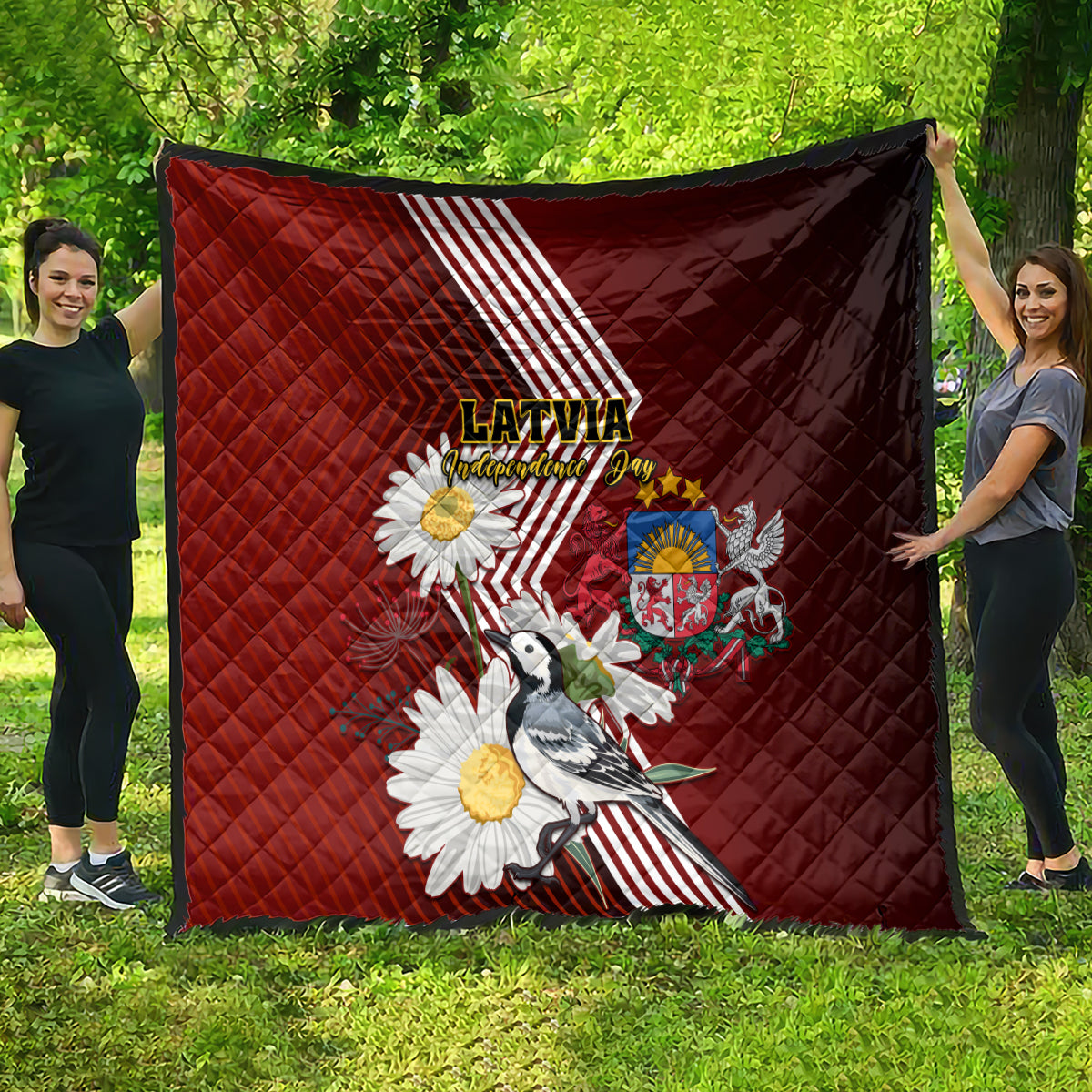 Red quilt shown unfolded with Latvian stripes, daisies, crest badge, and bird print