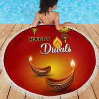 Red round Diwali beach blanket with paisley 'Happy Diwali' diya lamps and white fringe