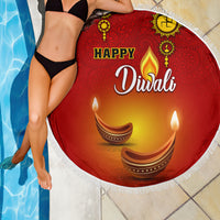 Red Diwali beach blanket with paisley diya lamps, 'Happy Diwali' text, fringed edge