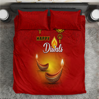 Red Diwali bedding set, paisley pattern with 'Happy Diwali' and diya candle graphics