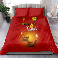 Red Diwali bedding set with paisley pattern, two pillows, 'Happy Diwali' and diya graphics