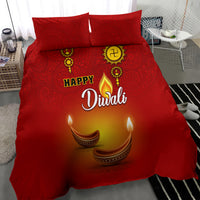 Red Diwali duvet set with paisley pattern, 'Happy Diwali' text and glowing diya candles