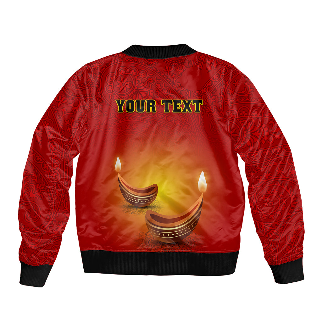 Red unisex bomber jacket with paisley pattern, 'YOUR TEXT' back print, diya flames