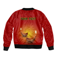 Red unisex bomber jacket with paisley pattern, 'YOUR TEXT' back print, diya flames
