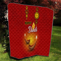 Red Diwali quilt with diamond quilting, Happy Diwali script, and glowing diya candle flames