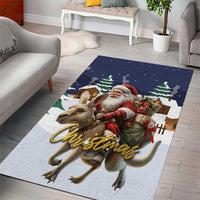 Rectangular Christmas area rug featuring Santa and reindeer with 'Christmas' text on dark blue