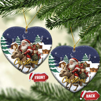 Heart-shaped ceramic Christmas ornament with Santa riding a kangaroo, gold hanging loop