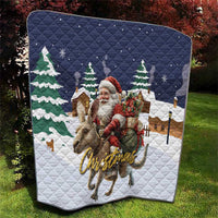 Quilted Christmas blanket in navy and white with Santa on reindeer and pine tree prints