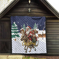 Quilted Christmas throw in navy and white featuring Santa on reindeer and pine trees