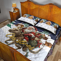 Christmas quilt bed set showing Santa and reindeer over white and navy patchwork