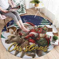 Christmas round area rug with Santa and reindeer, gold 'Christmas' lettering on blue