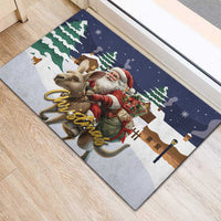 Christmas rubber doormat with Santa and kangaroo, snowy houses and pine tree border