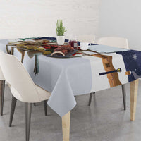 Gray Christmas tablecloth with reindeer-leg print and navy edge with snowflake details