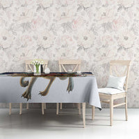 Light gray Christmas tablecloth with hanging reindeer-leg graphic