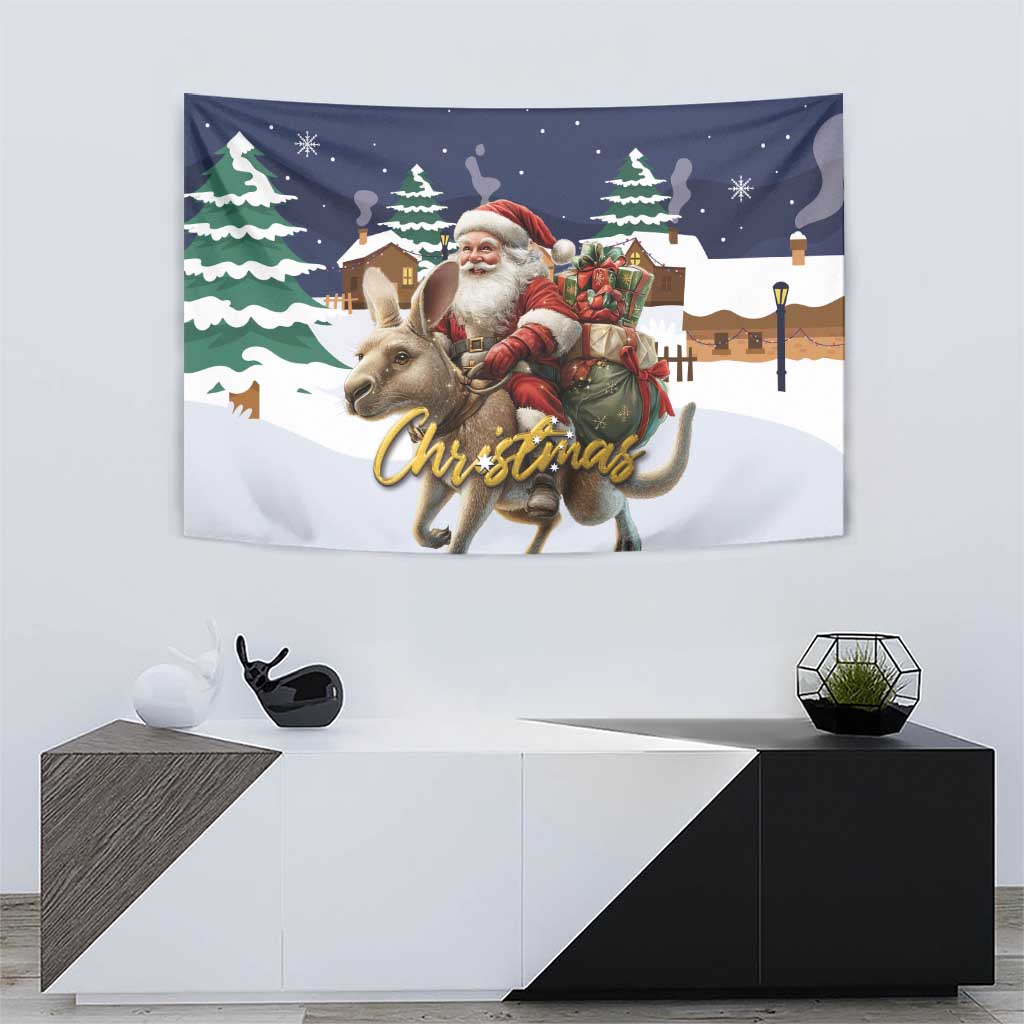 Christmas tapestry showing Santa and a reindeer with gift boxes, snowy houses, and trees