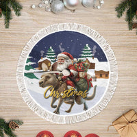 Fringed round Christmas tree skirt featuring Santa, reindeer, and green pine trees