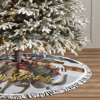 Fringed Christmas tree skirt with Santa-and-reindeer graphic on navy-and-white fabric