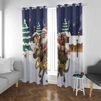 Navy Christmas curtains with Santa and reindeer print and hanging loops across top