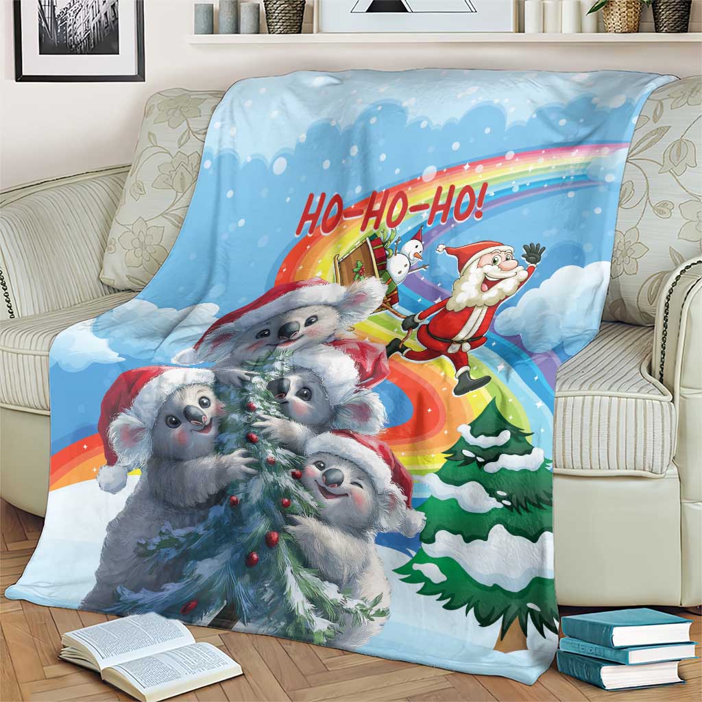 Blue Christmas blanket with koalas and Santa beside pine trees, 'HO-HO-HO' at top