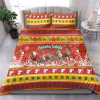 Red Christmas bedding set showing Santa and reindeer scene with festive patterned stripes