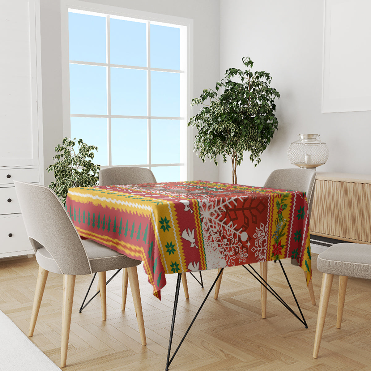 Holiday Christmas tablecloth on dining table with colorful geometric border pattern