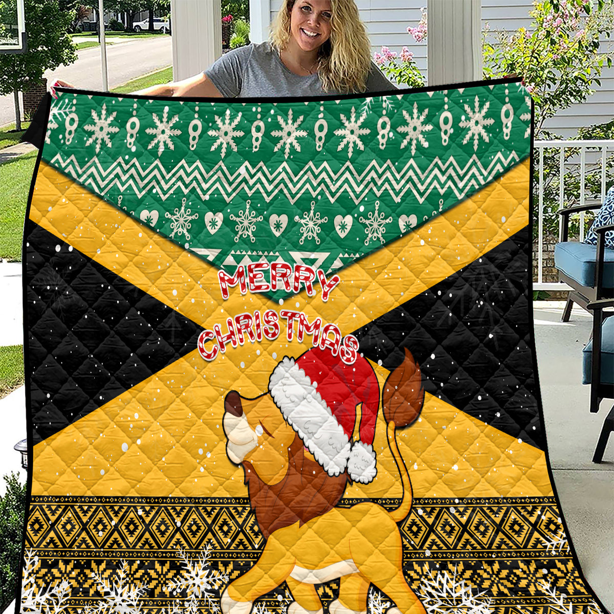 Christmas quilt blanket with green zigzag top, gold and black diamonds, Santa lion center.