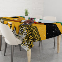 Christmas tablecloth on dining table with yellow, black, green and geometric print
