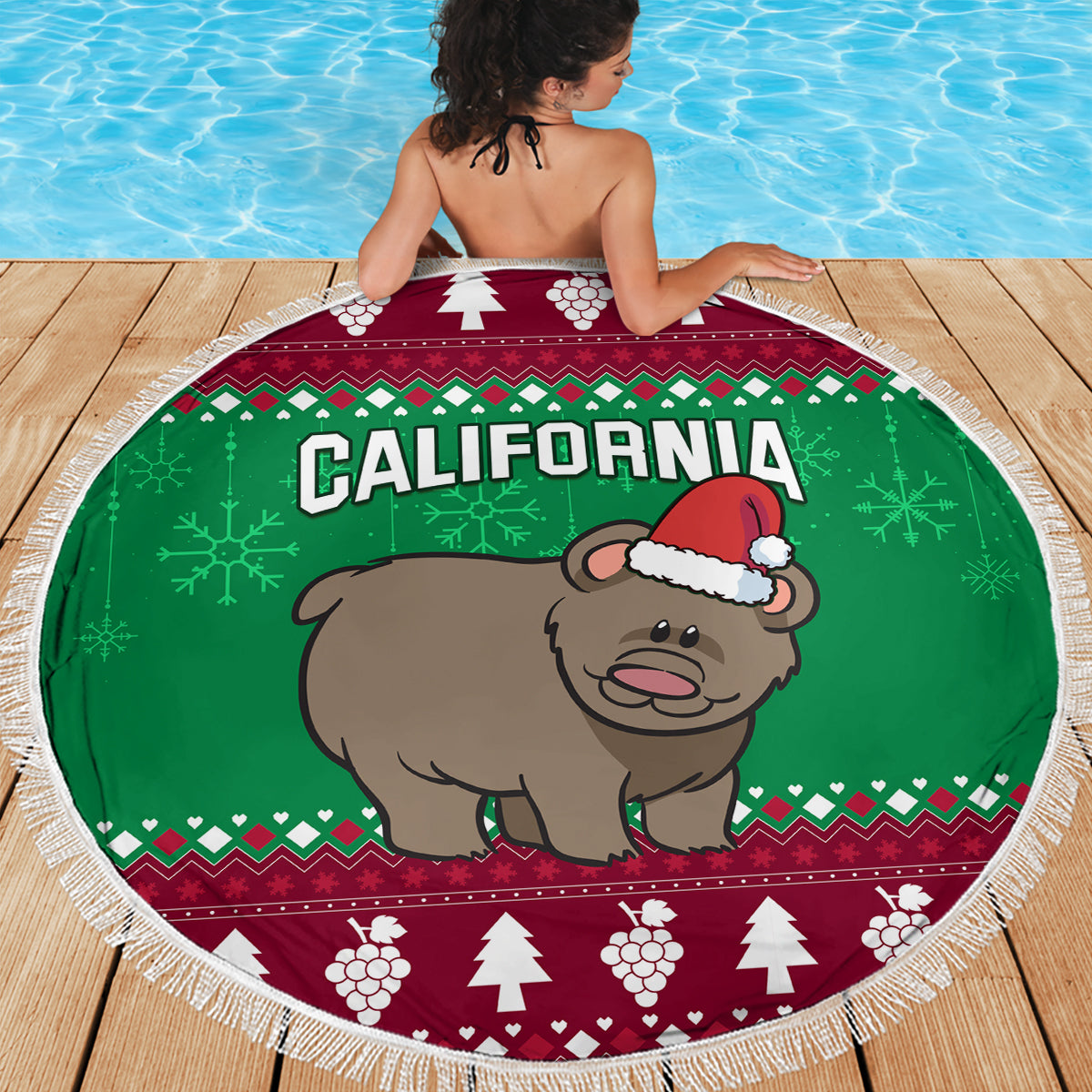 Round beach blanket with fringe: California text and Santa bear graphic on green Christmas pattern