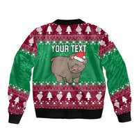 Unisex green bomber jacket with holiday bear, Santa hat, and YOUR TEXT, black rib hem