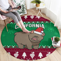Round Christmas carpet showing a Santa-hat bear on green with "California" lettering
