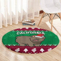 Round Christmas carpet with Santa-hat bear and "California" text on green background
