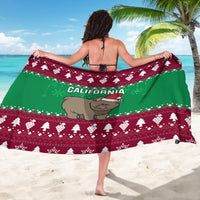 Green sarong viewed from back, California text and grizzly with Santa hat print