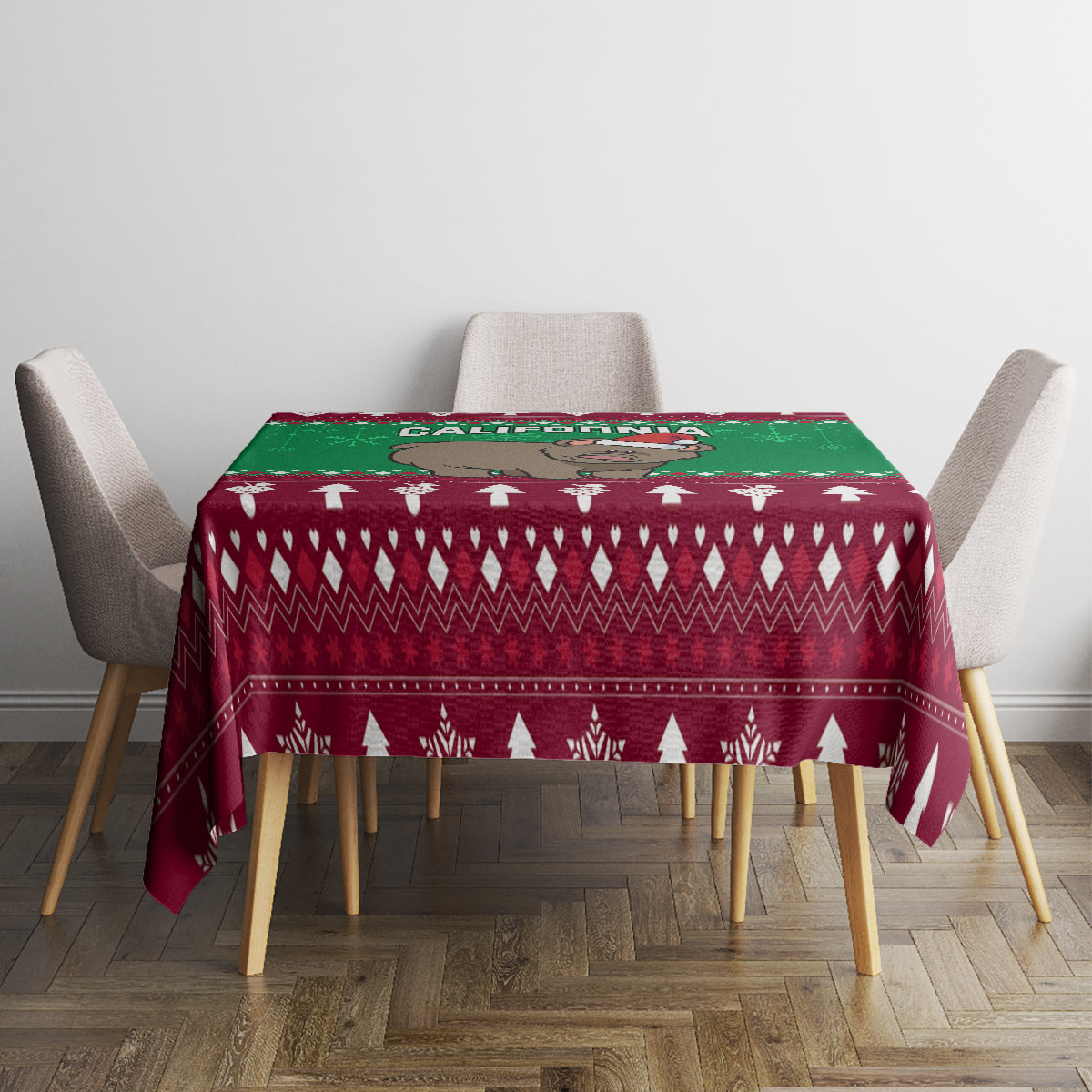 Christmas tablecloth on square table with maroon geometric pattern, green strip and white tree motifs