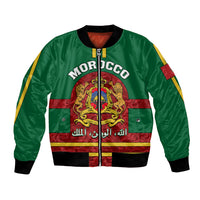 Green satin bomber jacket with front zipper, Morocco crest emblem graphic, ribbed cuffs