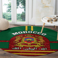 Green round carpet showing MOROCCO lettering and red coat of arms