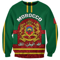 Green crewneck sweatshirt with Morocco text and coat-of-arms graphic
